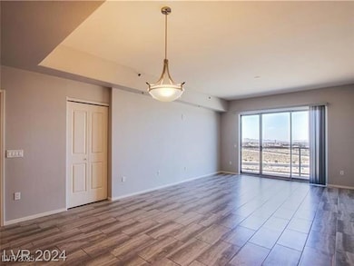 Unfurnished room featuring wood finished floors an