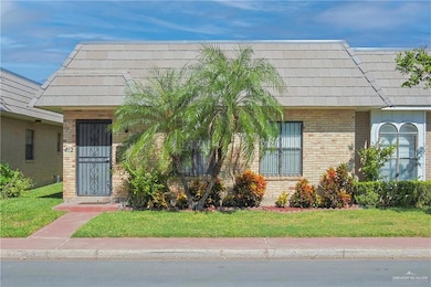 View of front of house featuring a front lawn