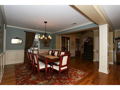 Entertain in this lovely dining room with built-in