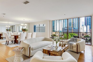 Living room with an inviting chandelier, light wo