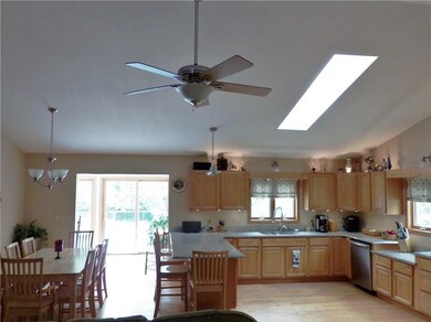 Sun-drenched kitchen & dining area,...