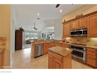 Spacious remodeled kitchen with golf course views.