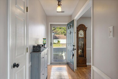 Entryway with light hardwood / wood-style flooring