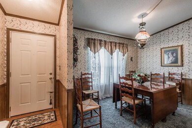 Entry foyer into formal dining and family room