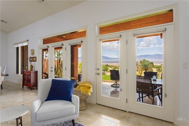 Doorway to outside with a mountain view, stone til