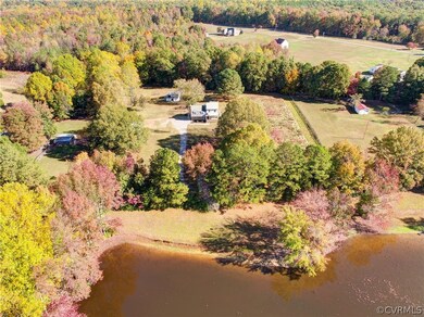 No water frontage but great water view. Road is between pond and property.