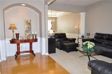 Entry Hall with wood floors, recess lighting and w