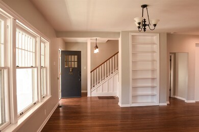 Additional view towards foyer & staircase. Note th