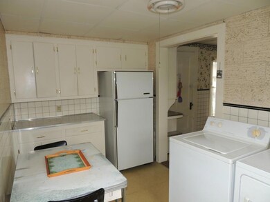 Additional kitchen space and laundry...