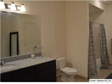 Master bath~complete with granite vanity, bathtub 