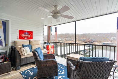 Spacious screened in deck with custom flooring