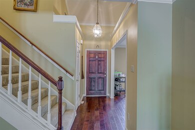 Come inside and be greeted with soaring two story 