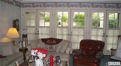 Front room opens to outdoor large side yard!