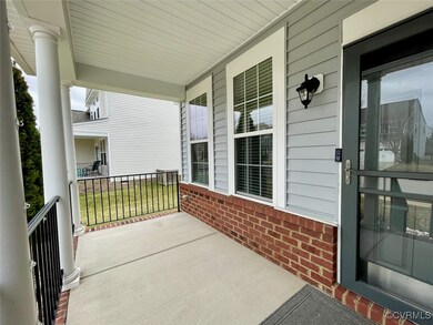 View of patio featuring covered porch