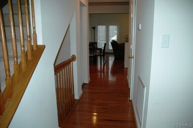 Hallway to kitchen/dining area/family room with ha
