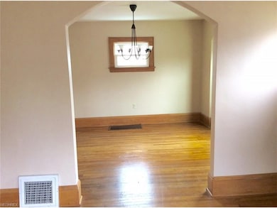View from living room into dining room located jus