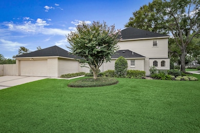 As seen here, the side entry garage, connected to the house by a breezeway.