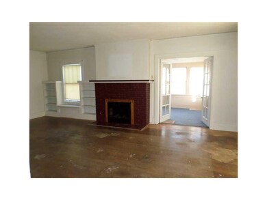 Family Room. All the floor in this room needs is r