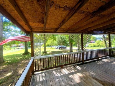 Front porch view of large front yard