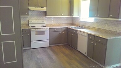 Kitchen with new dishwasher & disposal.