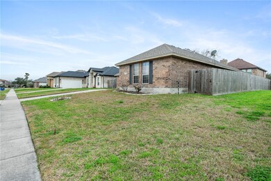 To the right of the home is currently a vacant lot