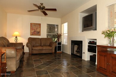 Family Rm w/ Cozy Gas FP Opens to Ktchn!