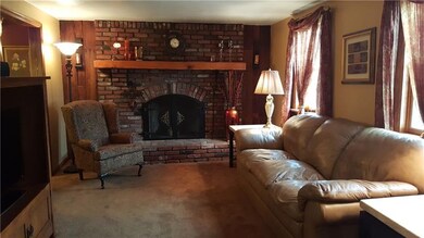 Dramatic all brick fireplace is a great focal poin