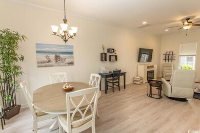 Dining space featuring baseboards, ornamental mold