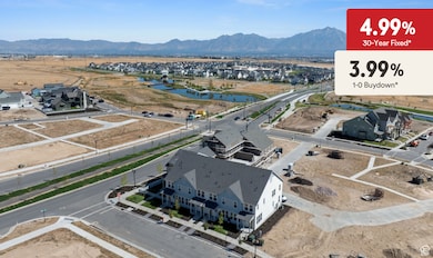 Aerial perspective of suburban area featuring a water and mountain view