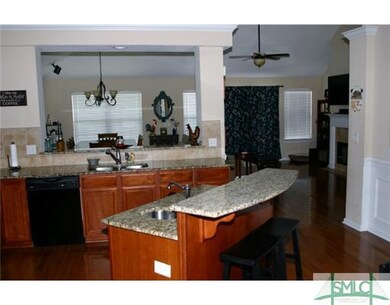 Kitchen. Kitchen island bar offers alternative sea