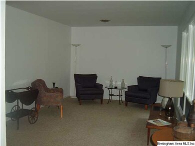 Large living room with a unique sliding wall that 