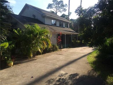 Exterior Front. Two story home with screen enclose