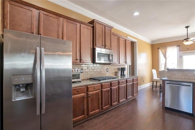 Kitchen featuring appliances with stainless steel 