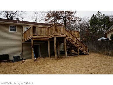 Exterior Back. Newer deck; storage room beneath de