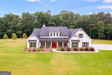 View of front of home featuring a porch and a fron