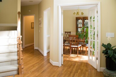 Stunning High Foyer, and wonderfully appointed Dining Room and Study, both with double french doors. 