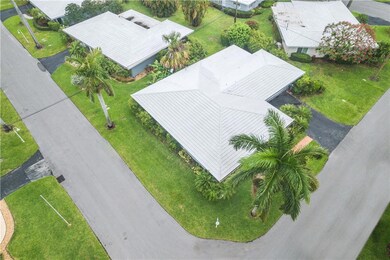 Large corner lot home with a hip roof