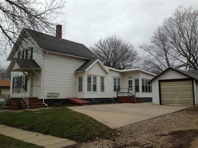 One car garage with cement driveway