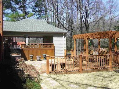 Scenic back yard offers hours of relaxation featur