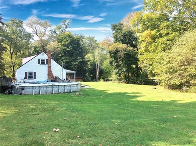 Perfectly situated on a private 1 acre lot...