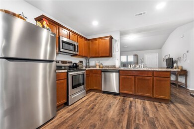 Electric range with microwave