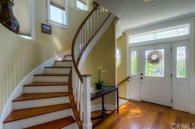 Beautiful entry with Brazilian Cherry Hardwood flo