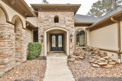 The stunning rock garden that lines the entrance to this amazing home gives a charming atmosphere!