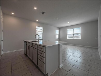 Kitchen looking into family room