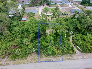 Aerial view of residential area featuring property