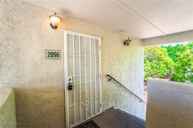 Doorway to property with stucco siding