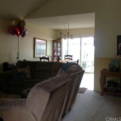 living room and adjacent dinning area patio slider