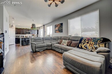 Living room featuring a toaster, visible vents, da