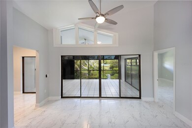 Living room with lanai out the sliding doors