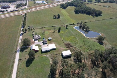 View of House and Pond-Toward Highway